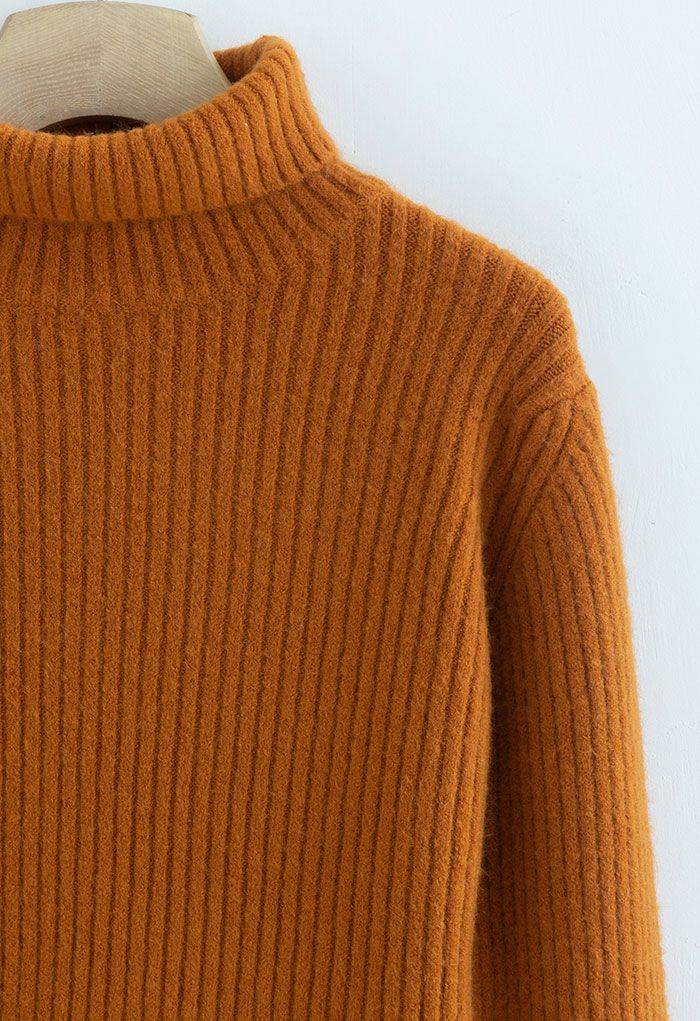 Turtleneck Asymmetric Split Hem Knit Sweater in Pumpkin