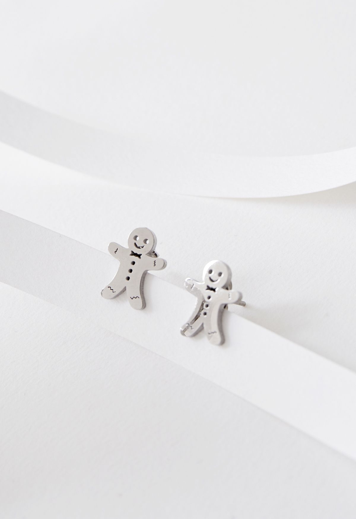 Cute Biscuit Man Earrings in Silver