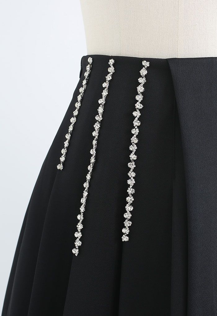 Crystal Chain Decorated Pleated Flap Mini Skirt in Black