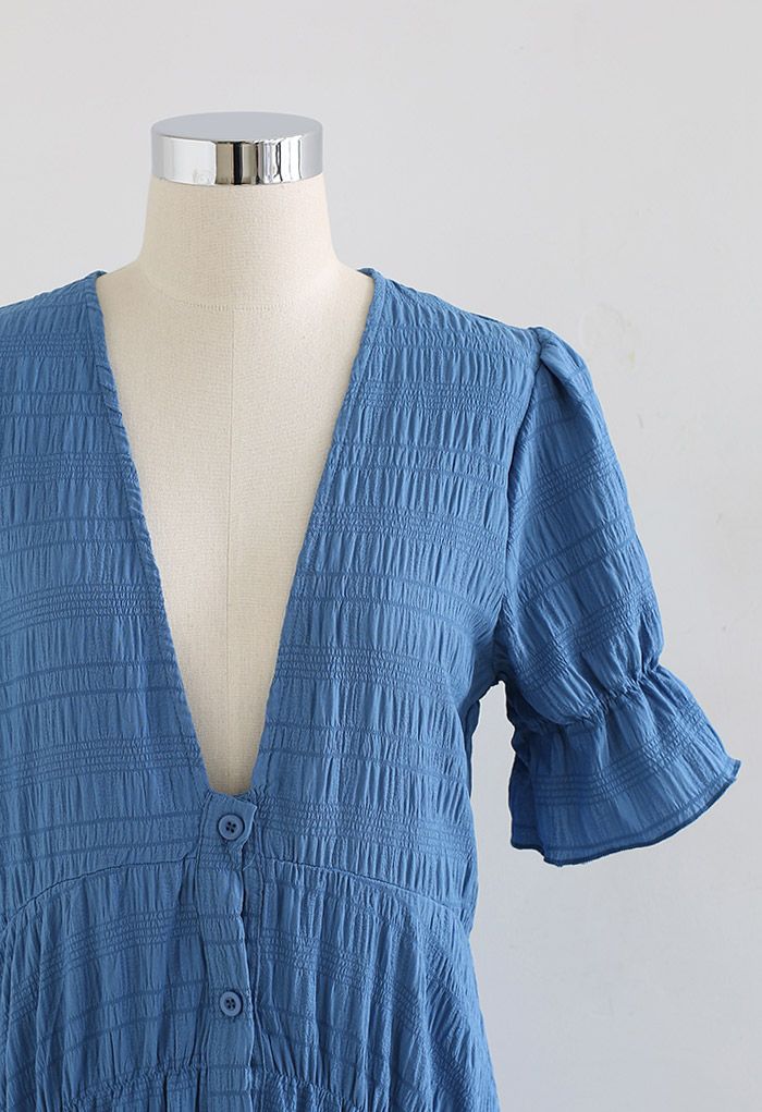 Deep V-Neck Embossed Asymmetric Hem Maxi Dress in Blue