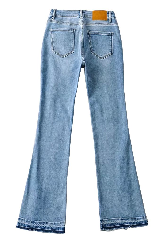 Buttoned Hem Ripped Flare Jeans
