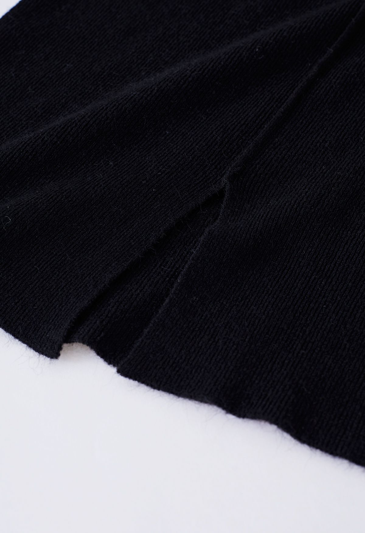 Seam Detail High Neck Slit Knit Top in Black