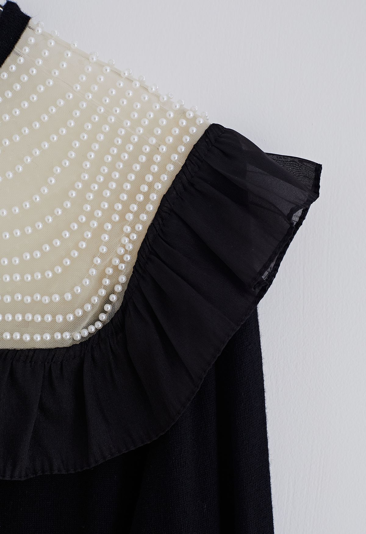 Pearly Neck Ruffle Knit Top in Black