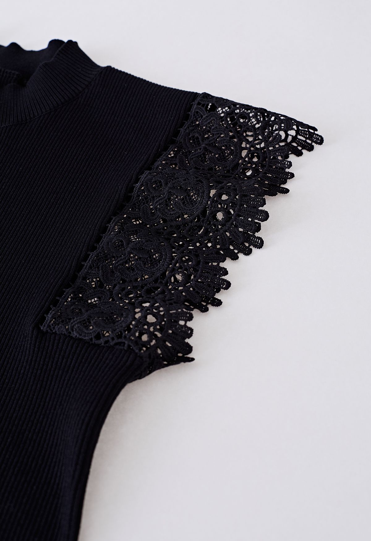 Mock Neck Lace Spliced Sleeveless Knit Top in Black