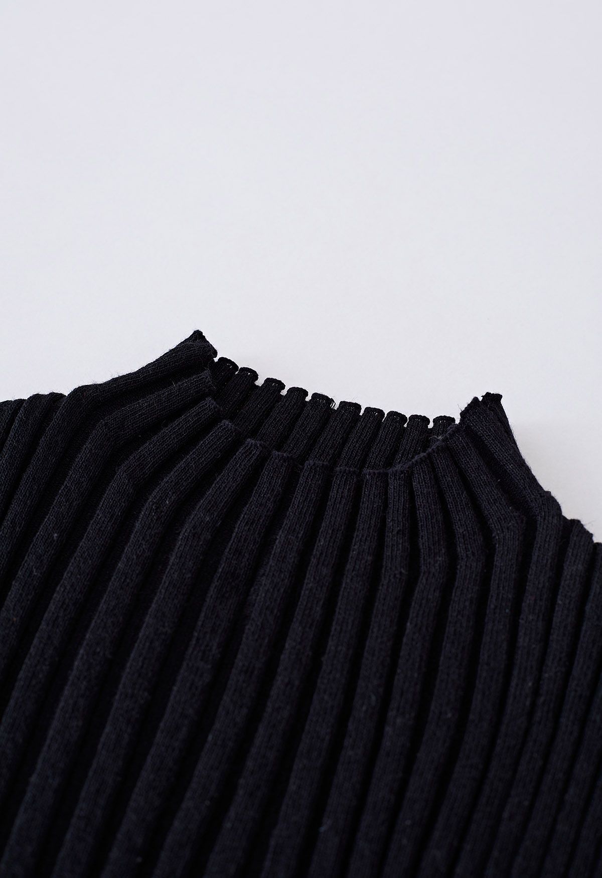 Mock Neck Sleeveless Rib Knit Top in Black