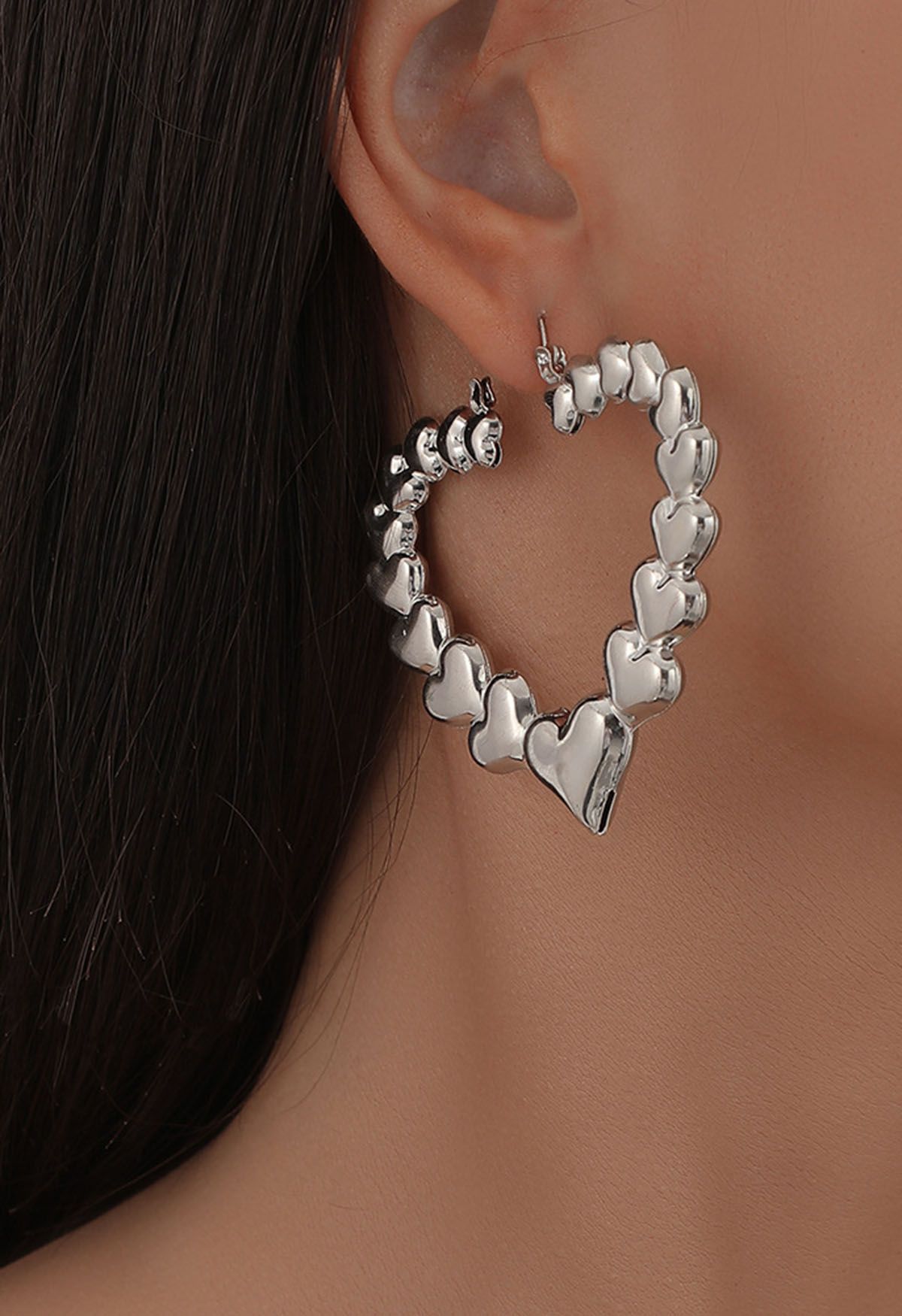 Hollow Out Metal Heart Earrings in Silver