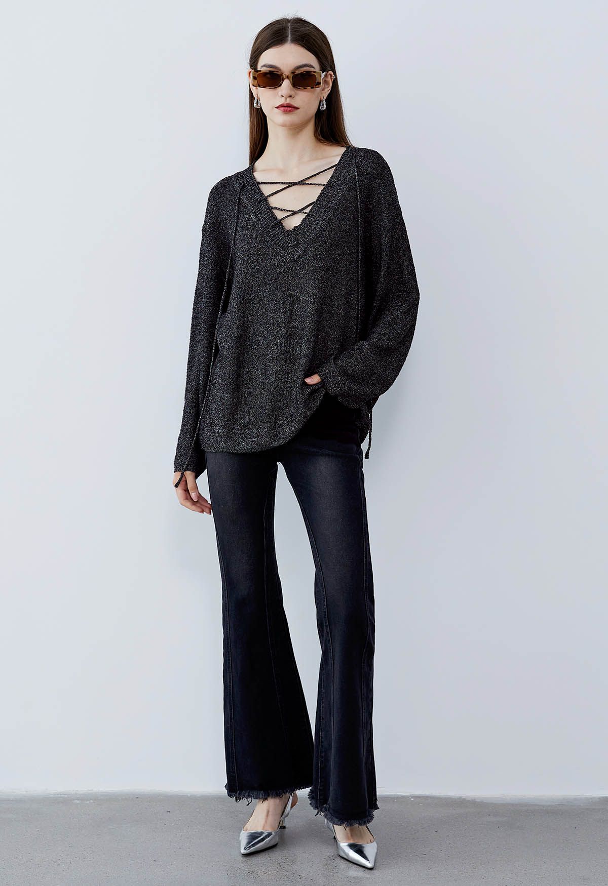 Slouchy V-Neck Lace-Up Knit Sweater in Black