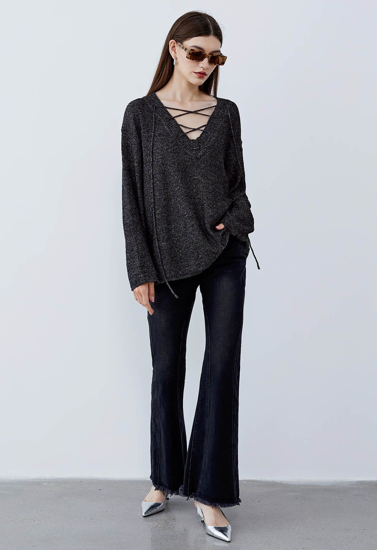 Slouchy V-Neck Lace-Up Knit Sweater in Black