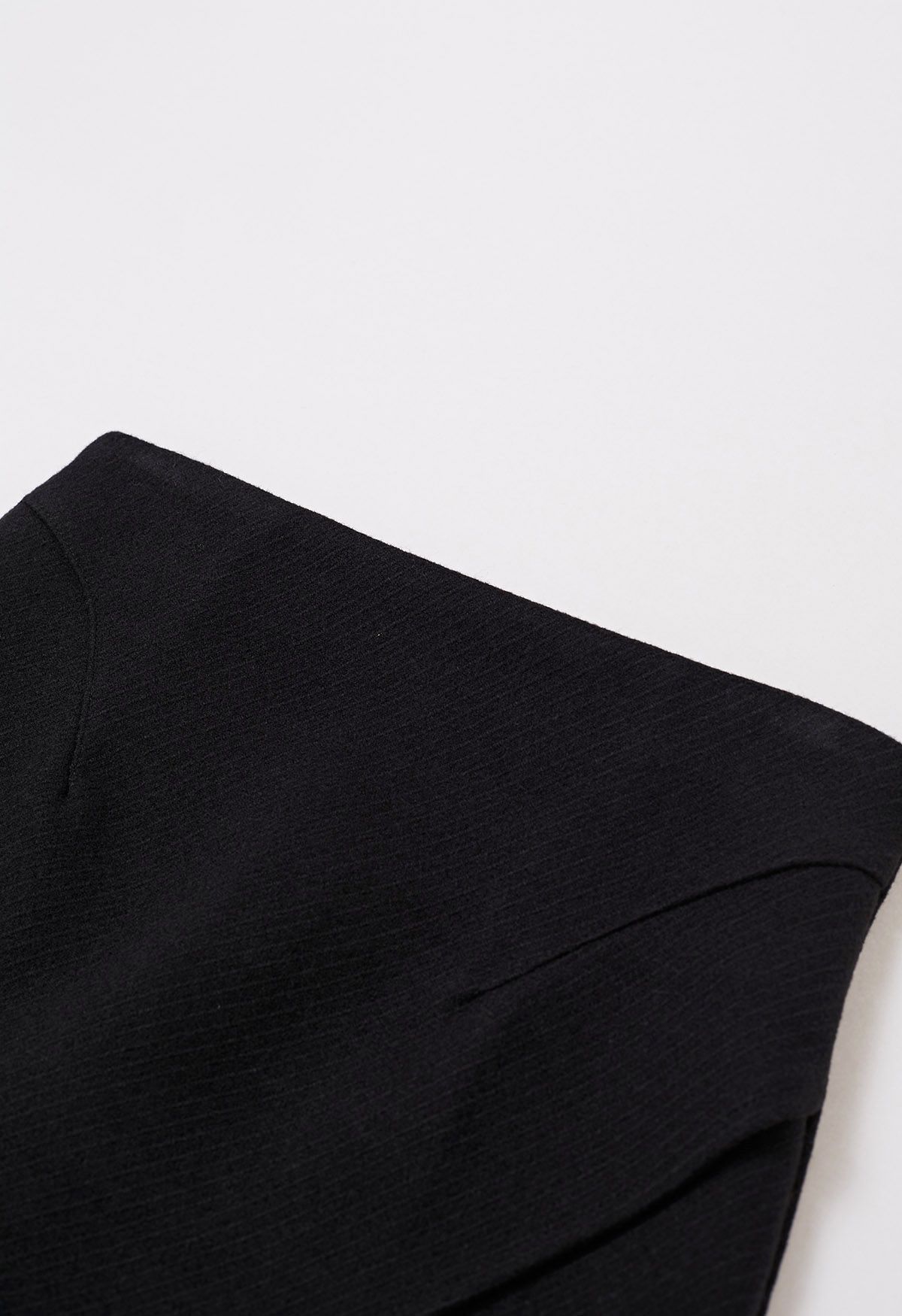 Notched Hem Wool-Blend Flap Mini Skirt in Black
