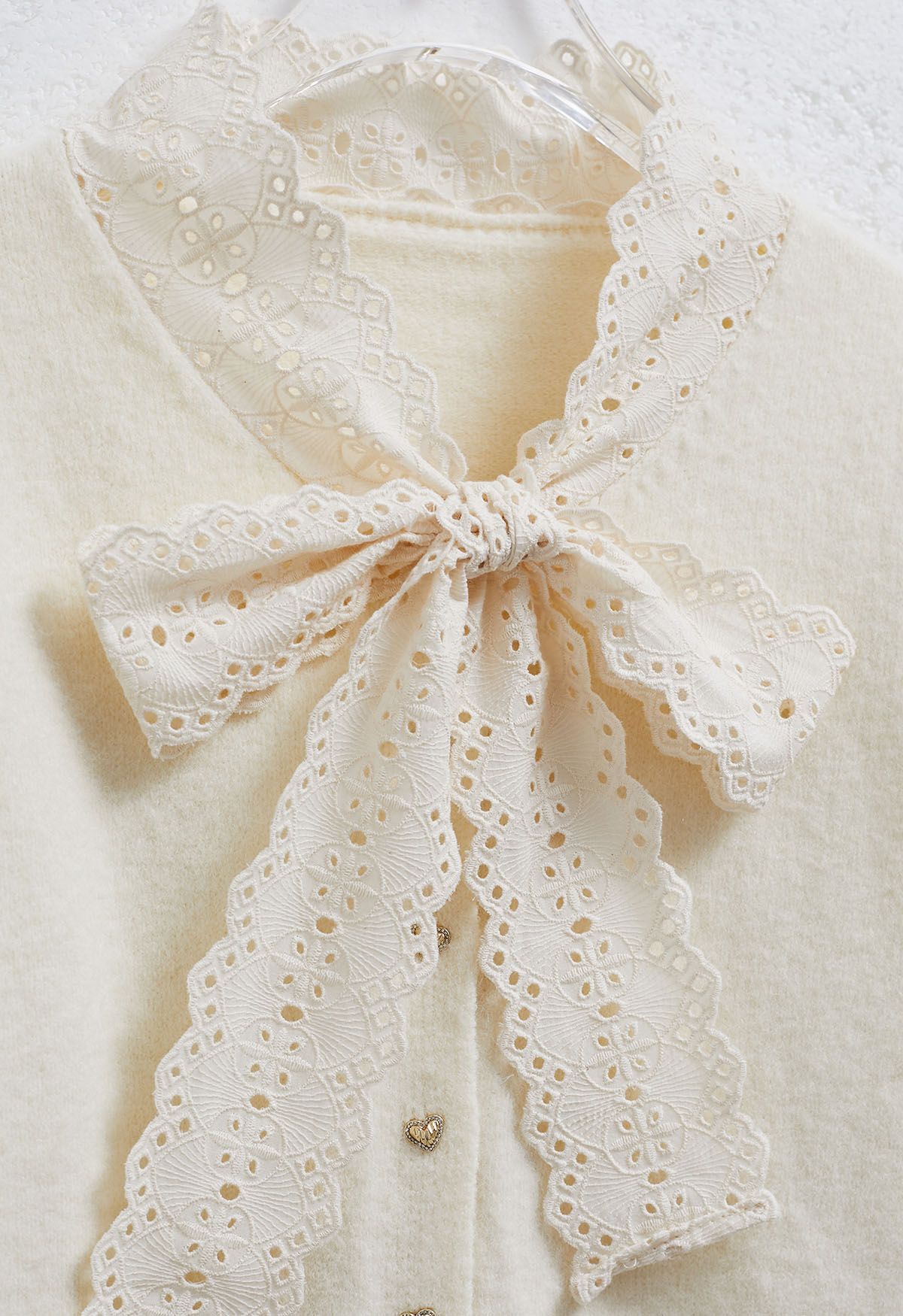 Embroidered Eyelet Bowknot Heart Button Fuzzy Knit Cardigan in Cream