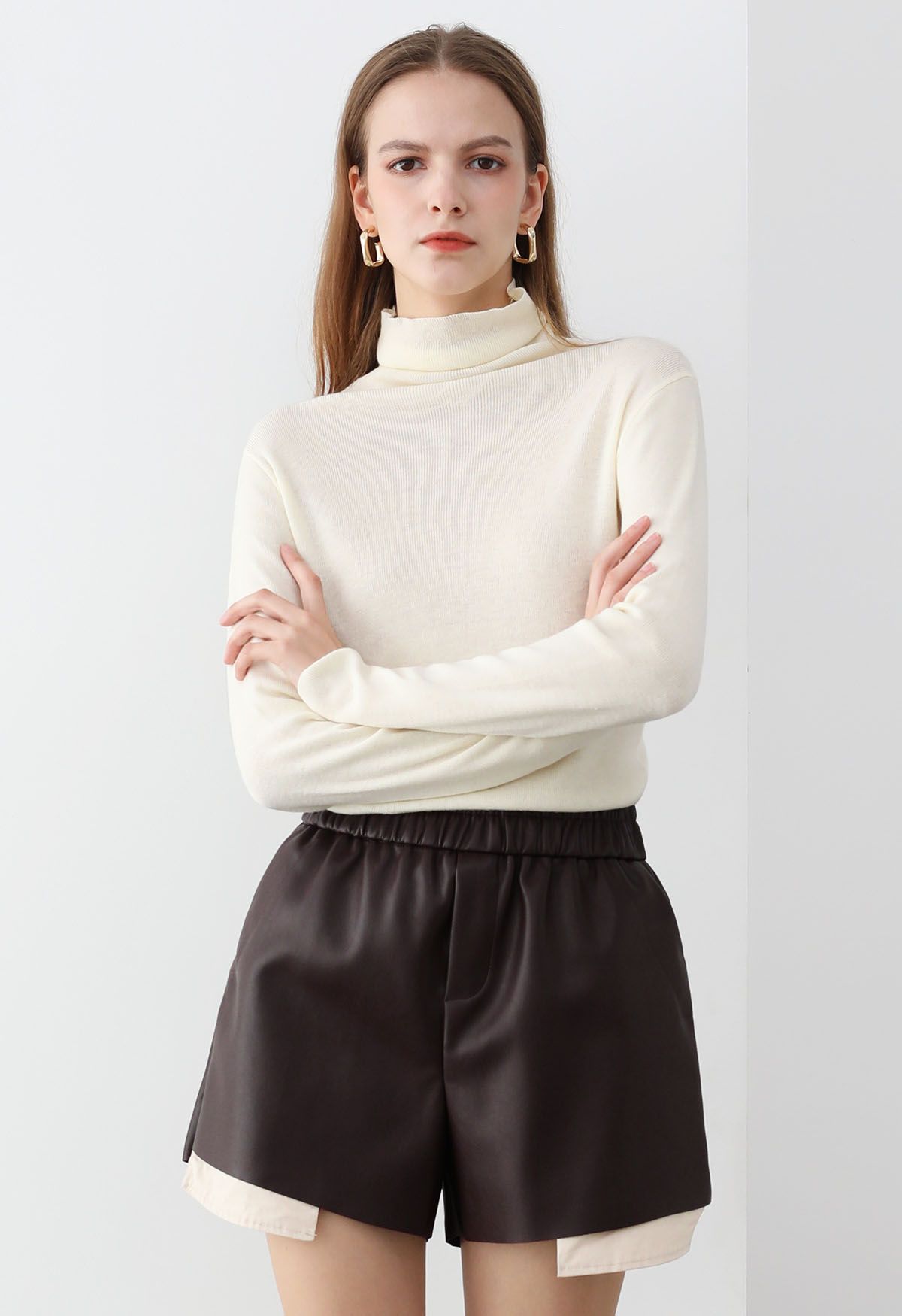 Side Pleat High Neck Ribbed Knit Top in Cream
