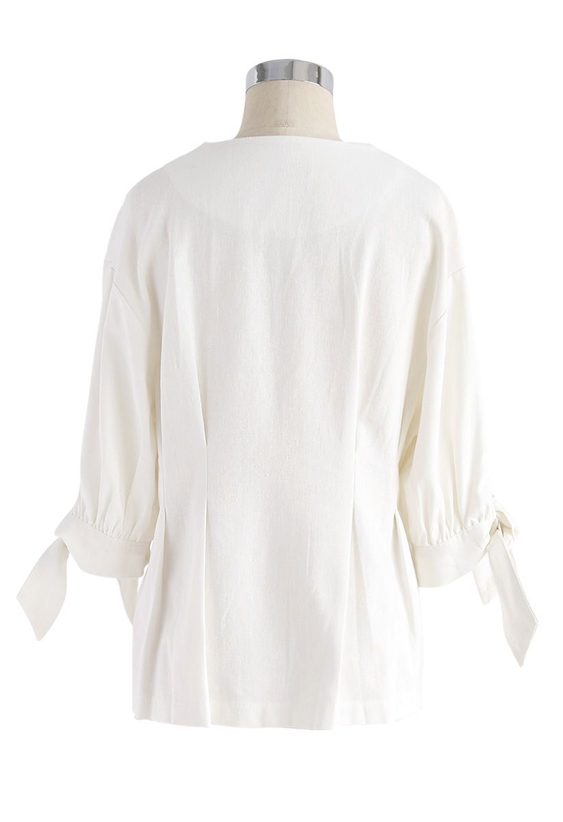 There Is A Light V-Neck Top in White 