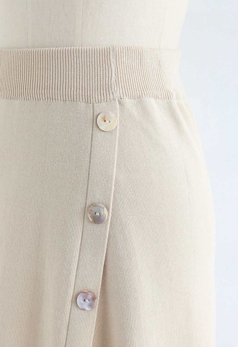 Shell Buttons Trim Asymmetric Knit Skirt in Cream