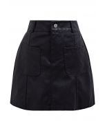 Patch Pocket Faux Leather Mini Skirt in Black