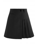 Twin Buttons Pleated Flap Mini Skirt in Black